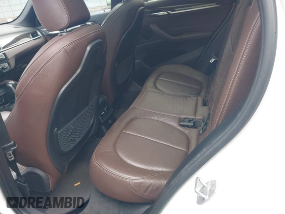 2018 BMW X1 xDrive28i with VIN WBXHT3C36J5L32162, listed as a IAAI auction lot 41802315 with 80,422 mi miles. Bid and sale history available at carsss.com. Image 8.