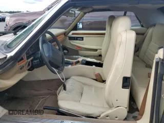 1995 Jaguar XJS with VIN SAJNX2747SC196723, listed as a Copart auction lot 74147364 with 70,138 mi miles and Salvage Title. Bid and sale history available at carsss.com. Image 7.