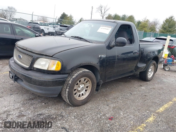 2001 Ford F-150 XL with VIN 2FTZF07211CA54107, listed as a IAAI auction lot 41450483 with 153,699 mi miles. Bid and sale history available at carsss.com. Image 2.