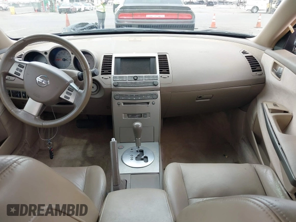 2004 Nissan Maxima SE with VIN 1N4BA41EX4C927086, listed as a IAAI auction lot 41734539 with 135,331 mi miles and . Bid and sale history available at DreamBid. Image 5.
