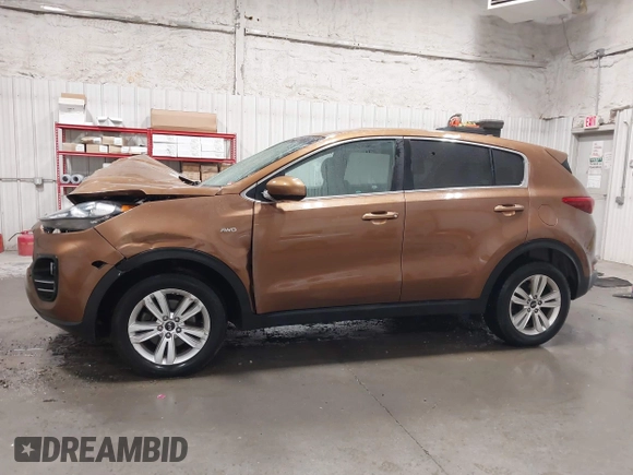 2018 Kia Sportage LX with VIN KNDPMCAC9J7403108, listed as a IAAI auction lot 41946497 with 123,023 mi miles. Bid and sale history available at carsss.com. Image 15.