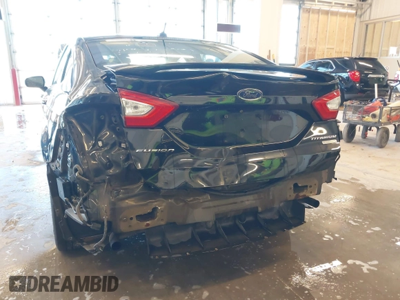 2014 Ford Fusion Titanium with VIN 3FA6P0K93ER115805, listed as a IAAI auction lot 41009602 with 136,021 mi miles. Bid and sale history available at carsss.com. Image 18.