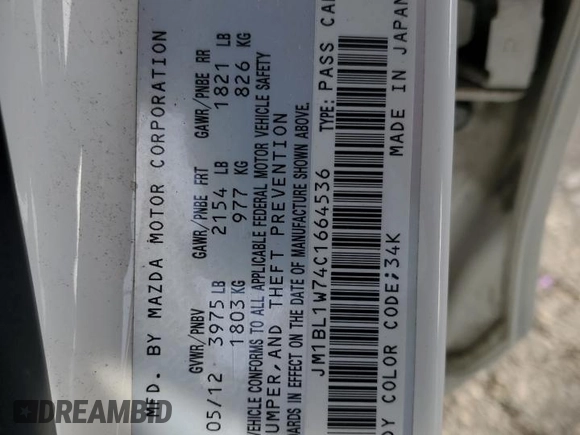 2012 Mazda 3 i Grand Touring with VIN JM1BL1W74C1664536, listed as a Copart auction lot 82973564 with 121,758 mi miles and Salvage Title. Bid and sale history available at carsss.com. Image 14.
