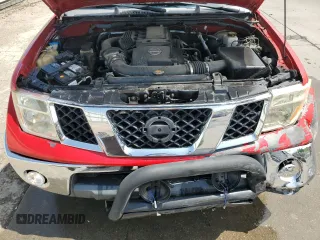 2006 Nissan Frontier LE with VIN 1N6AD07W76C460568, listed as a Copart auction lot 62859015 with 145,127 mi miles and Salvage title. Bid and sale history available at DreamBid. Image 11.
