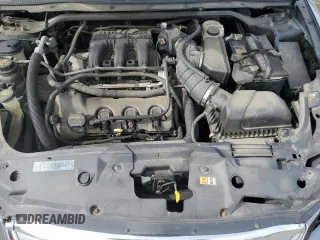 2011 Ford Taurus Limited z VIN 1FAHP2FW0BG179663, wystawiony jako Copart lot #54362415 z przebiegiem 158 449 mil mil oraz Szkoda całkowita • Salvage title. Historia ofert i sprzedaży dostępna na DreamBid. Obrazek 11.