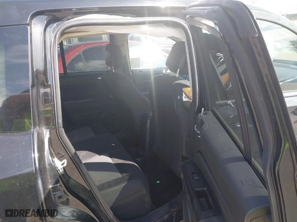 2014 Jeep Compass Sport with VIN 1C4NJCBA6ED774568, listed as a IAAI auction lot 41637704 with 116,136 mi miles. Bid and sale history available at carsss.com. Image 8.