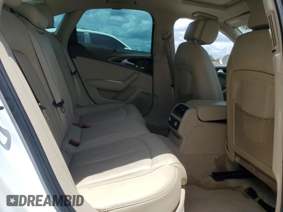 2016 Audi A6 Premium Plus с VIN WAUGFAFC4GN062659, выставлен на аукционе Copart как лот 63183565 с пробегом 89 559 миль миль и Списание • Salvage title. История ставок и продаж доступна на DreamBid. Изображение 10.