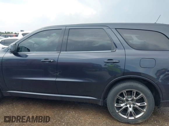 2013 Dodge Durango R/T with VIN 1C4SDHCT6DC658802, listed as a IAAI auction lot 42510985 with 67,653 mi miles and . Bid and sale history available at DreamBid. Image 13.