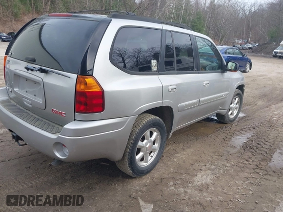 2004 GMC Envoy SLE with VIN 1GKDS13S442350938, listed as a IAAI auction lot 41790810 with 161,998 mi miles. Bid and sale history available at carsss.com. Image 4.