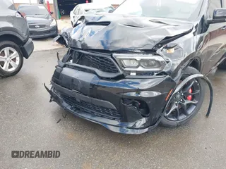 2023 Dodge Durango SRT Hellcat Premium with VIN 1C4SDJH90PC557375, listed as a IAAI auction lot 41328850 with 30,697 mi miles and . Bid and sale history available at DreamBid. Image 18.