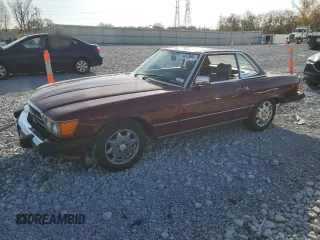 1987 Mercedes-Benz 560 with VIN WDBBA48D0HA056013, listed as a Copart auction lot 77407894 with 144,639 mi miles and Clean Title. Bid and sale history available at carsss.com. Image 1.