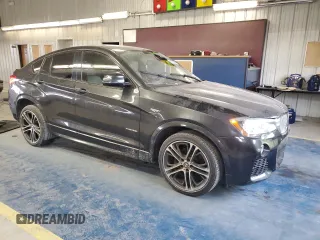 2015 BMW X4 xDrive35i with VIN 5UXXW5C51F0E88340, listed as a Copart auction lot 41765245 with 140,510 mi miles and Clean title. Bid and sale history available at DreamBid. Image 4.