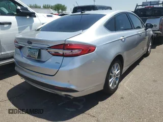 2017 Ford Fusion SE with VIN 3FA6P0H77HR388403, listed as a IAAI auction lot 42708389 with 120,864 mi miles and . Bid and sale history available at DreamBid. Image 1.