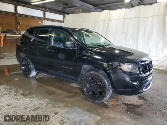2016 Jeep Compass Sport with VIN 1C4NJDBBXGD598240, listed as a Copart auction lot 57887495 with 152,932 mi miles and Salvage title. Bid and sale history available at DreamBid. Image 4.