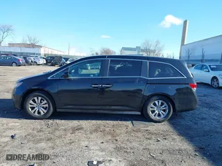 2016 Honda Odyssey SE with VIN 5FNRL5H34GB139571, listed as a IAAI auction lot 41602695 with 118,960 mi miles. Bid and sale history available at carsss.com. Image 14.