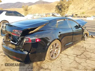 2022 Tesla Model S with VIN 5YJSA1E50NF462647, listed as a IAAI auction lot 41354668 with Not Provided miles and . Bid and sale history available at DreamBid. Image 4.