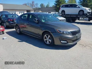 2015 Kia Optima LX with VIN 5XXGM4A74FG396236, listed as a IAAI auction lot 42165862 with 127,383 mi miles. Bid and sale history available at carsss.com. Image 1.