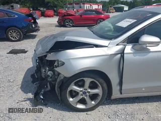 2015 Ford Fusion SE with VIN 3FA6P0H90FR274063, listed as a IAAI auction lot 42585936 with 118,702 mi miles and . Bid and sale history available at DreamBid. Image 6.