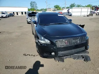 2014 Nissan Maxima SV z VIN 1N4AA5AP7EC908175, wystawiony jako Copart lot #61656265 z przebiegiem 282 757 mil mil oraz Szkoda całkowita • Salvage title. Historia ofert i sprzedaży dostępna na DreamBid. Obrazek 13.