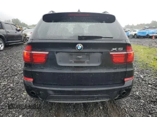 2012 BMW X5 35i with VIN 5UXZV4C57CL765053, listed as a Copart auction lot 59997275 with 157,943 mi miles and Salvage title. Bid and sale history available at DreamBid. Image 6.