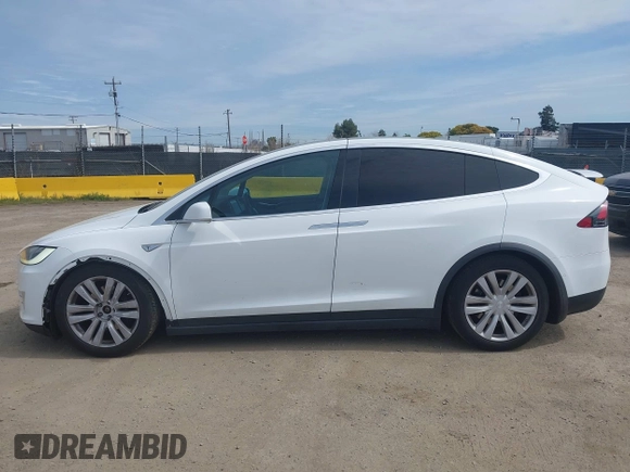 2016 Tesla Model X 70D with VIN 5YJXCBE24GF002020, listed as a IAAI auction lot 41799528 with 149,556 mi miles. Bid and sale history available at carsss.com. Image 14.