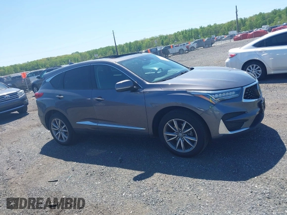 2020 Acura RDX Technology with VIN 5J8TC2H54LL019140, listed as a IAAI auction lot 42102793 with 56,519 mi miles and . Bid and sale history available at DreamBid. Image 13.