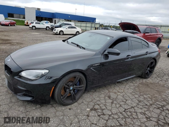 2015 BMW M6 z VIN WBS6C9C59FD467652, wystawiony jako Copart lot #66093293 z przebiegiem Nie podano mil oraz . Historia ofert i sprzedaży dostępna na DreamBid. Obrazek 1.