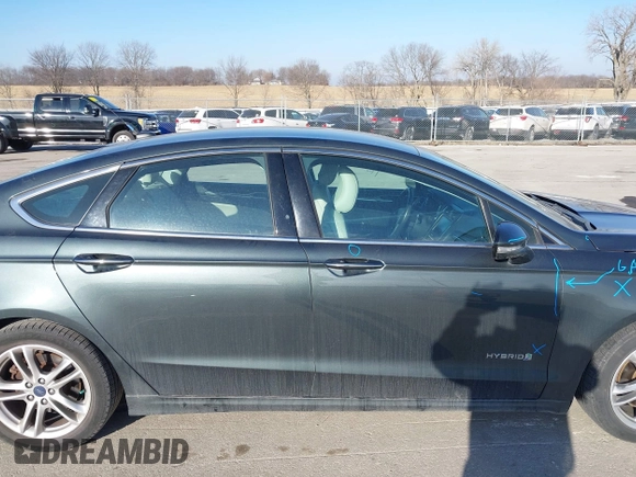 2016 Ford Fusion Titanium Hybrid with VIN 3FA6P0RU6GR156622, listed as a IAAI auction lot 41178887 with 92,423 mi miles. Bid and sale history available at carsss.com. Image 14.