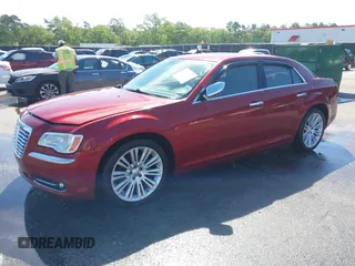 2012 Chrysler 300 Limited with VIN 2C3CCACG5CH165341, listed as a IAAI auction lot 42036190 with 184,536 mi miles. Bid and sale history available at carsss.com. Image 2.