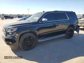 2015 Chevrolet Tahoe LTZ with VIN 1GNSKCKC8FR174762, listed as a Copart auction lot 79930574 with 232,518 mi miles and Salvage title. Bid and sale history available at DreamBid. Image 1.