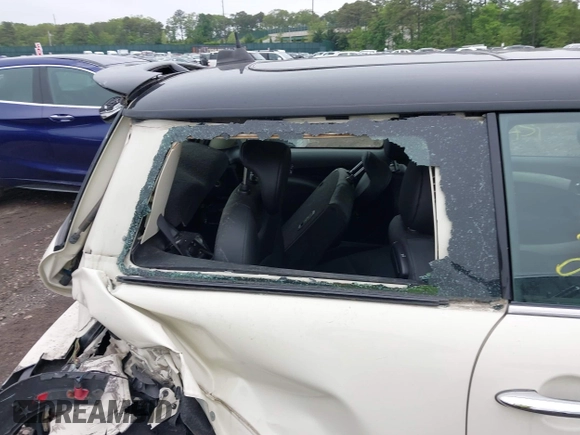 2013 MINI Hardtop S with VIN WMWSV3C51DT480022, listed as a IAAI auction lot 42398793 with Not provided miles and . Bid and sale history available at DreamBid. Image 12.