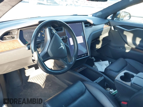 2020 Tesla Model S Long Range with VIN 5YJSA1E24LF413888, listed as a IAAI auction lot 41214903 with 42,711 mi miles and . Bid and sale history available at DreamBid. Image 5.