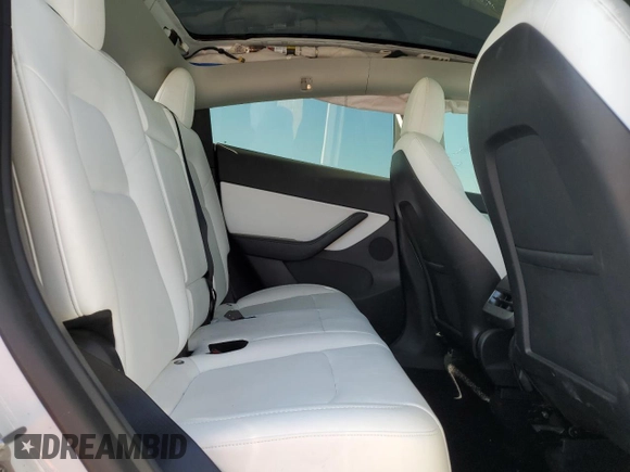 2022 Tesla Model Y Performance with VIN 7SAYGDEF9NF392197, listed as a Copart auction lot 57259105 with 43,400 mi miles and Salvage title. Bid and sale history available at DreamBid. Image 10.