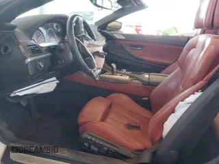 2013 BMW M6 с VIN WBSLZ9C59DDZ77823, выставлен на аукционе Copart как лот 62354225 с пробегом 74 704 миль миль и Списание • Salvage title. История ставок и продаж доступна на DreamBid. Изображение 7.