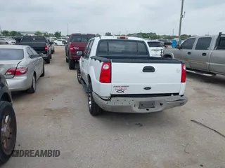 2002 Ford Explorer Sport Trac Value with VIN 1FMZU67E32UB86348, listed as a IAAI auction lot 42304599 with 202,563 mi miles and . Bid and sale history available at DreamBid. Image 3.