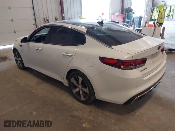 2018 Kia Optima SX with VIN 5XXGW4L27JG237960, listed as a IAAI auction lot 41956461 with 87,085 mi miles and . Bid and sale history available at DreamBid. Image 3.