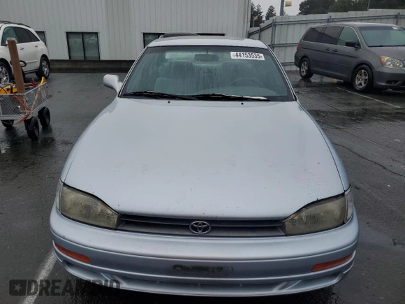 1994 Toyota Camry LE with VIN 4T1SK12E8RU411682, listed as a Copart auction lot 44153535 with 214,022 mi miles and Salvage Title. Bid and sale history available at carsss.com. Image 5.