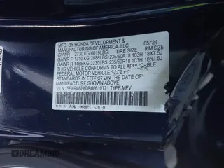 2024 Honda Odyssey EX-L with VIN 5FNRL6H60RB061017, listed as a IAAI auction lot 41399491 with 6,921 mi miles and . Bid and sale history available at DreamBid. Image 9.