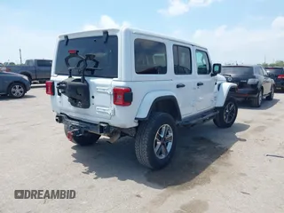 2018 Jeep Wrangler Unlimited Sahara z VIN 1C4HJXEG0JW245118, wystawiony jako IAAI lot #42066614 z przebiegiem 83 743 mil mil oraz . Historia ofert i sprzedaży dostępna na DreamBid. Obrazek 4.