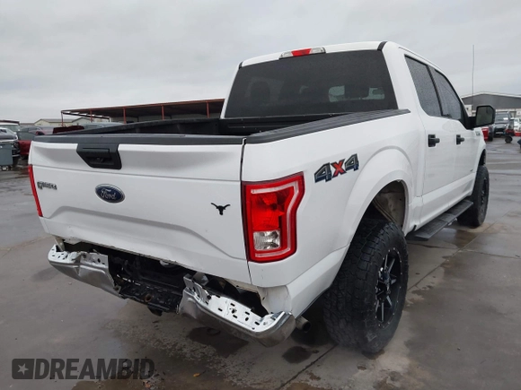 2015 Ford F-150 XLT with VIN 1FTEW1EP7FKE61564, listed as a IAAI auction lot 41889545 with 152,057 mi miles. Bid and sale history available at carsss.com. Image 4.
