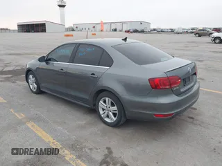 2013 Volkswagen Jetta Sedan Hybrid SE with VIN 3VW637AJ0DM228954, listed as a IAAI auction lot 41918495 with 138,232 mi miles. Bid and sale history available at carsss.com. Image 3.