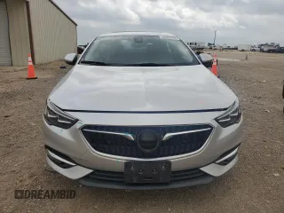 2018 Buick Regal Essence с VIN W04GP6SX8J1086932, выставлен на аукционе Copart как лот 54824185 с пробегом 69 473 миль миль и Списание • Salvage title. История ставок и продаж доступна на DreamBid. Изображение 5.
