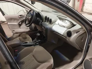 2002 Pontiac Grand Am SE1 with VIN 1G2NF52FX2C128240, listed as a IAAI auction lot 41356415 with 15,900 mi miles. Bid and sale history available at carsss.com. Image 5.