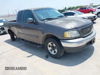 2003 Ford F-150 XL z VIN 1FTRX17233KA87739, wystawiony jako IAAI lot #42256524 z przebiegiem 289 115 mil mil oraz . Historia ofert i sprzedaży dostępna na DreamBid. Obrazek 1.