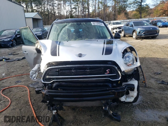 2016 MINI Countryman S with VIN WMWZC5C55GWU22112, listed as a Copart auction lot 82132654 with 60,210 mi miles and Salvage Title. Bid and sale history available at DreamBid. Image 5.
