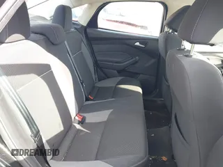 2013 Ford Focus SE z VIN 1FADP3F28DL312357, wystawiony jako IAAI lot #41798311 z przebiegiem 98 280 mil mil oraz . Historia ofert i sprzedaży dostępna na DreamBid. Obrazek 8.