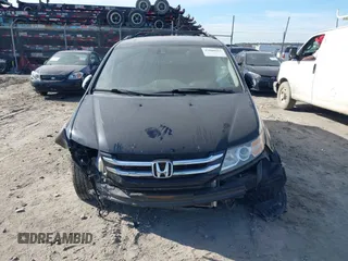 2015 Honda Odyssey EX-L with VIN 5FNRL5H65FB088106, listed as a IAAI auction lot 41880915 with 176,539 mi miles and . Bid and sale history available at carsss.com. Image 12.