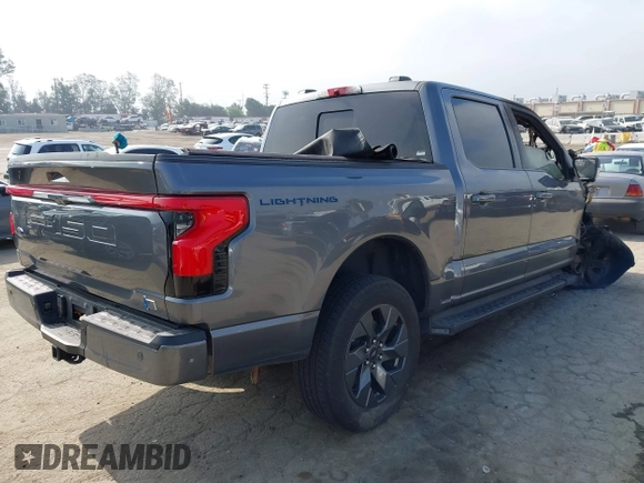 2023 Ford F-150 Lightning Pro z VIN 1FTVW1EV5PWG19585, wystawiony jako IAAI lot #42343575 z przebiegiem Nie podano mil oraz . Historia ofert i sprzedaży dostępna na DreamBid. Obrazek 4.