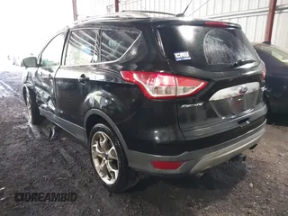 2015 Ford Escape Titanium with VIN 1FMCU9J98FUB00525, listed as a IAAI auction lot 42547989 with 194,040 mi miles and . Bid and sale history available at DreamBid. Image 3.