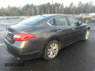 2011 Infiniti M37 with VIN JN1BY1AR6BM374647, listed as a IAAI auction lot 37949396 with 182,645 mi miles. Bid and sale history available at carsss.com. Image 4.